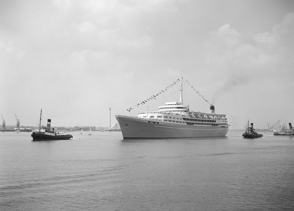 Detail of A port bow view of 'Southern Cross' (1955) under tow leaving Southhampton by unknown